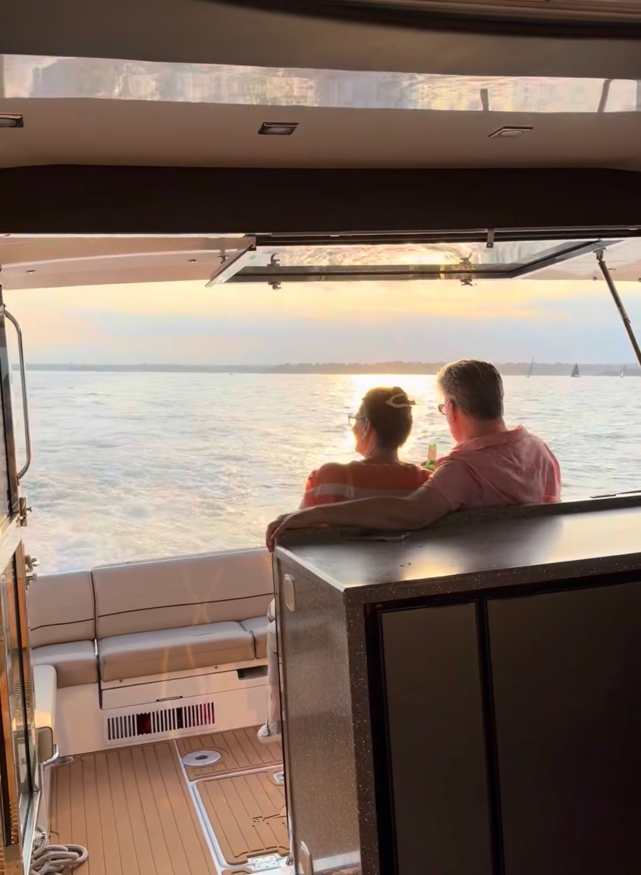 Couple celebrating an anniversary aboard a private yacht